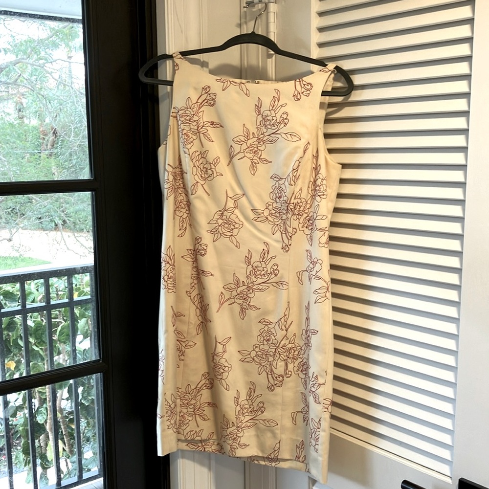 Ann Taylor ivory free with roses embroidered through out the dress.